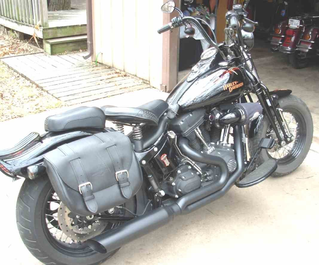 D&D Fat Cat 2-into-1 black exhaust system installed on 1984–2017 Harley-Davidson® Softail
